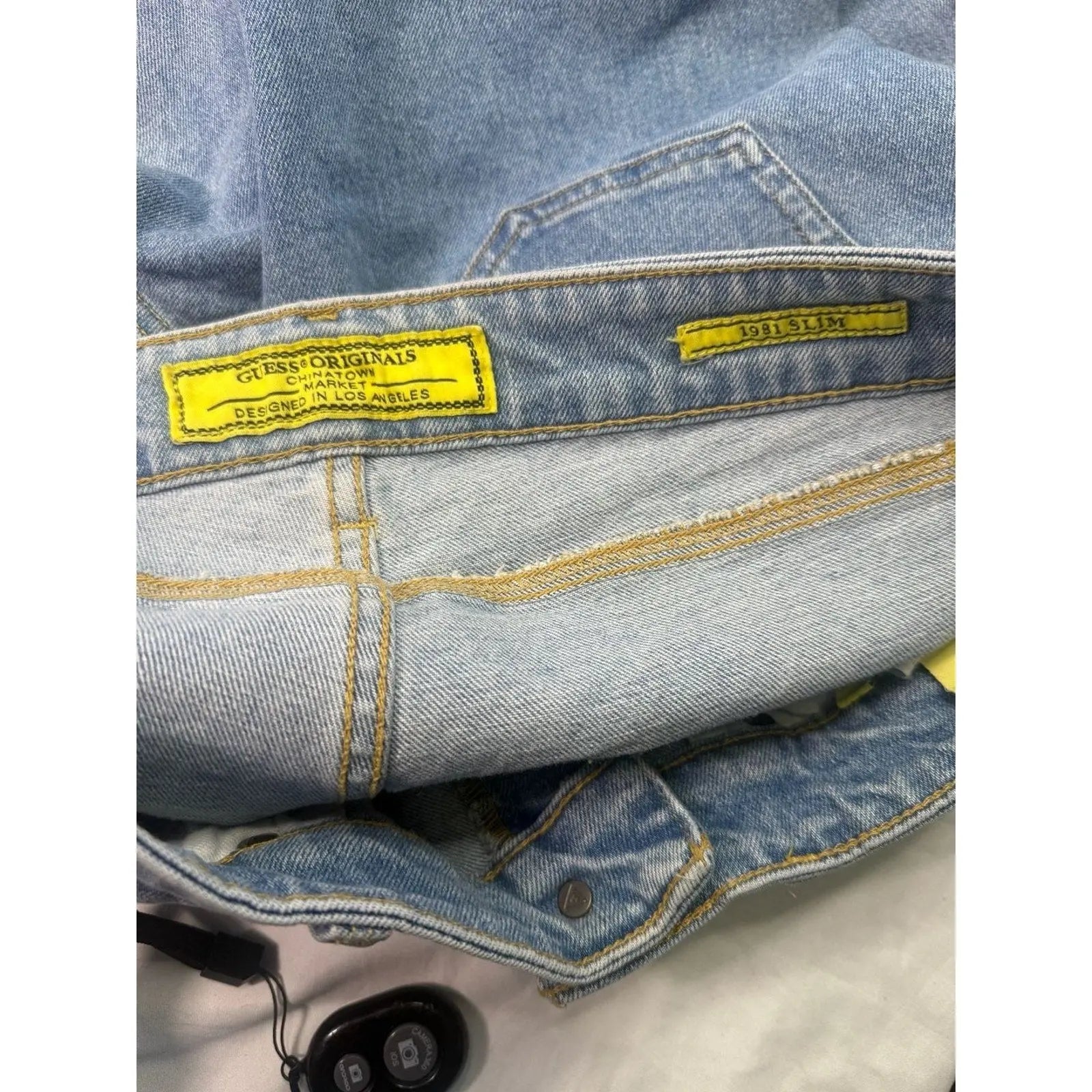 GUESS Originals x Chinatown Market Smiley 1981 Slim Distressed Jeans GUESS Originals