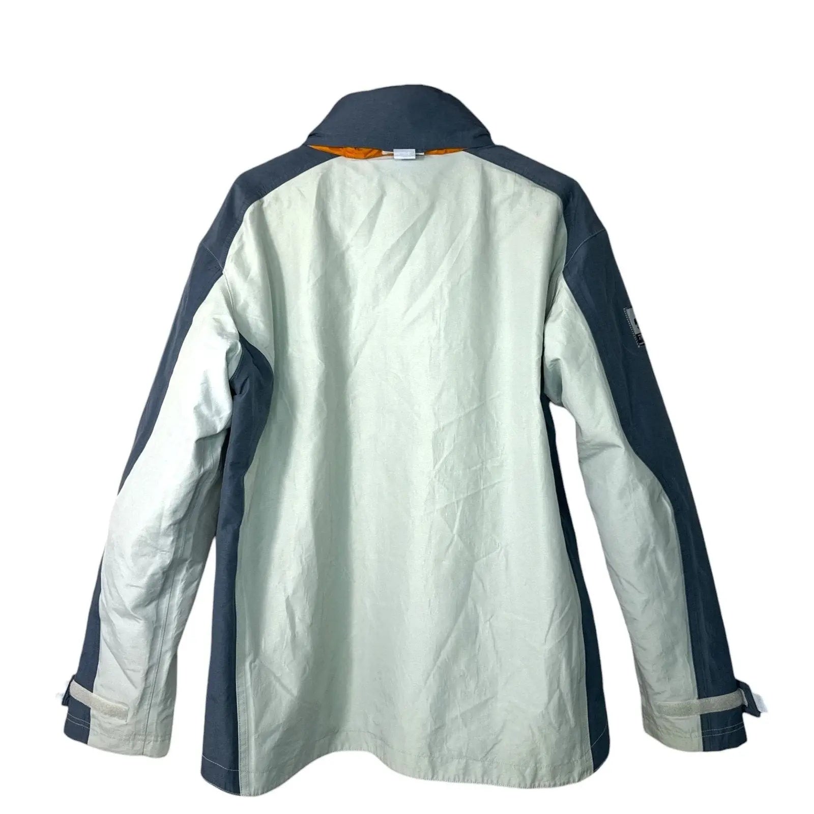 Tribord Women's Gray and Blue Waterproof Hooded Ski Jacket giving blooms foundation