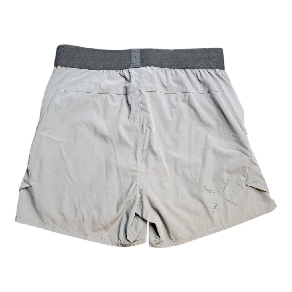 Lululemon License to Train Linerless Short 5" in Gull Grey giving blooms foundation