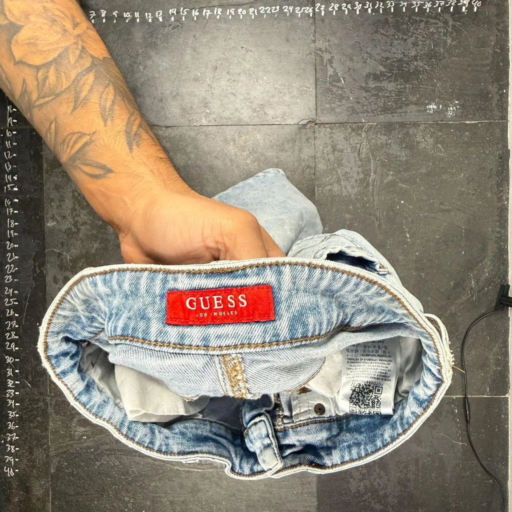 Guess slim tapered distressed jeans Guess