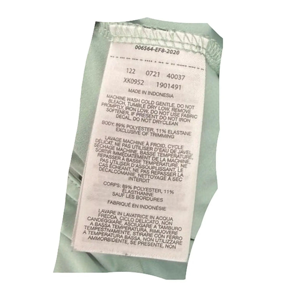 Columbia spray green sleeveless drawstring waist dress made of polyester and elastane. Care label visible.
