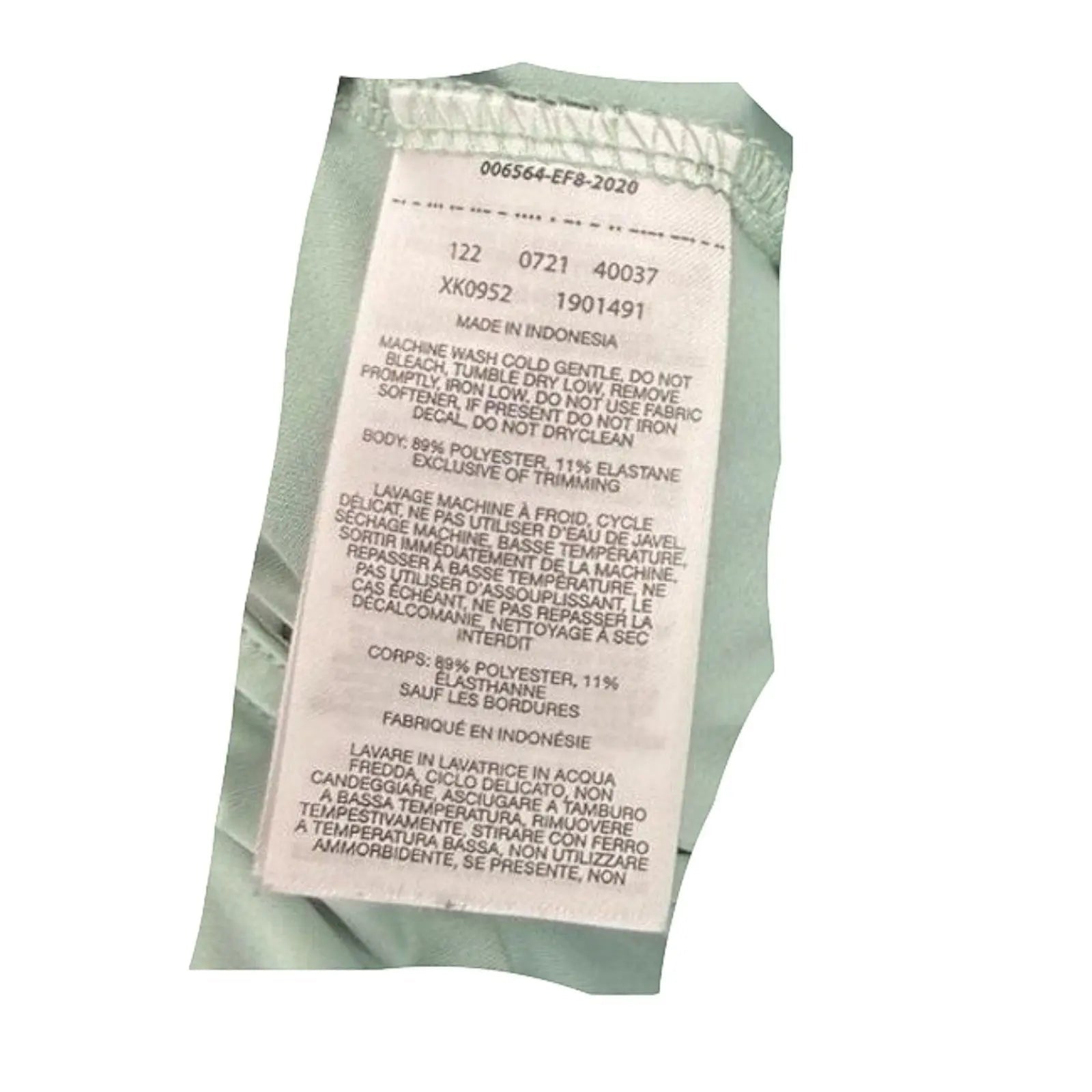 Columbia spray green sleeveless drawstring waist dress made of polyester and elastane. Care label visible.