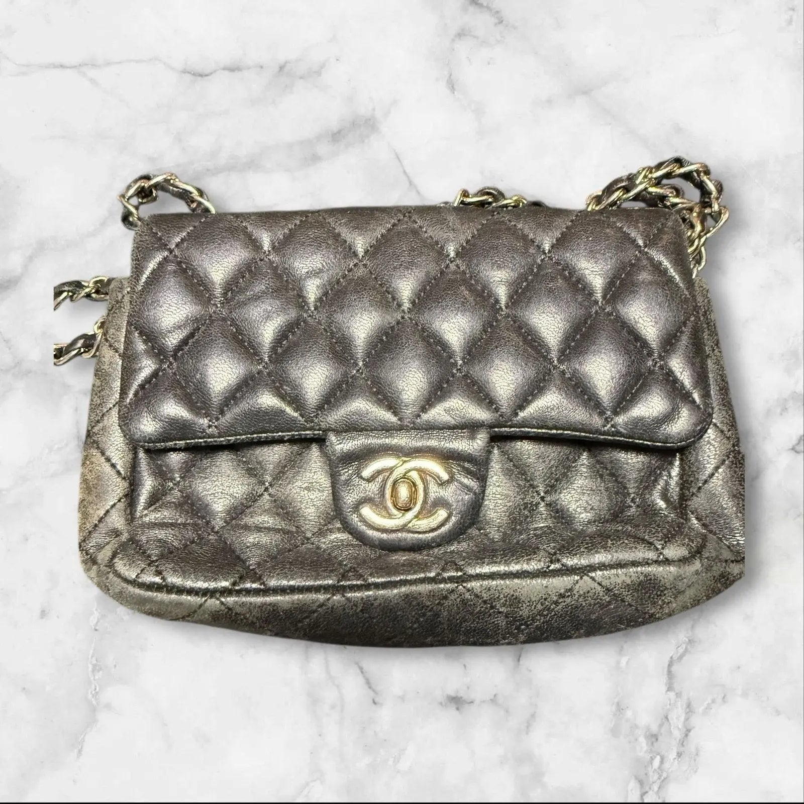 CHANEL Quilted Mini Flap Bag, Metallic Charocoal Leather, Silver-Tone Hardware. Chanel
