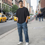 The Room Collective Armani Exchange A|X blue denim cargo jeans with contrast stitching and multiple pockets. Size 33.