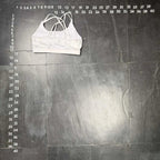 The Room Collective white Lululemon Free to Be Serene bra with strappy back detail, size M. Made from nylon and spandex blend.
