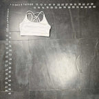 The Room Collective white Lululemon Free to Be Serene bra, size M, with strappy back detail. Ideal for yoga.