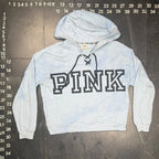 The Room Collective light blue and white tie-dye hoodie with lace-up detail and black PINK logo, size M.