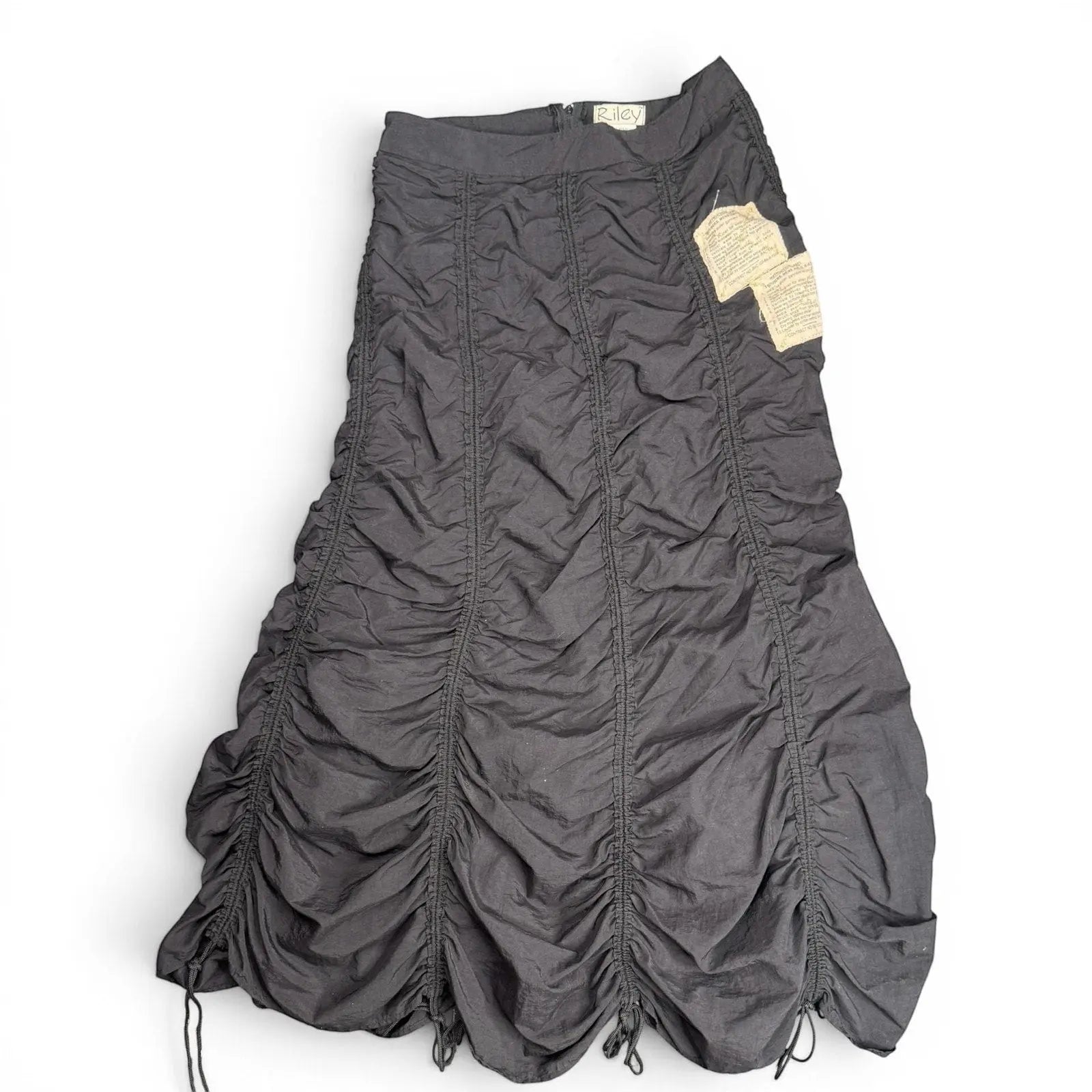The Room Collective Riley black ruched nylon parachute skirt with adjustable hem and vintage labels. Size S.