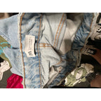 The Room Collective Zara high rise light wash denim shorts with five-pocket styling and zip fly.