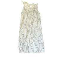 The Room Collective white mini dress with black abstract swirl print, halter neck, and tie-back detail. Lightweight crinkled fabric.
